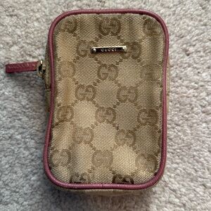 Small Gucci GG canvas pouch
